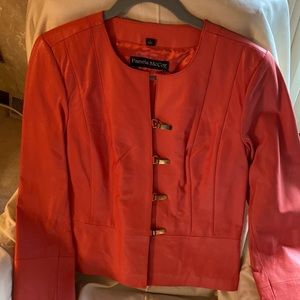 Pamela McCoy pink leather jacket with gold hardware. Size small